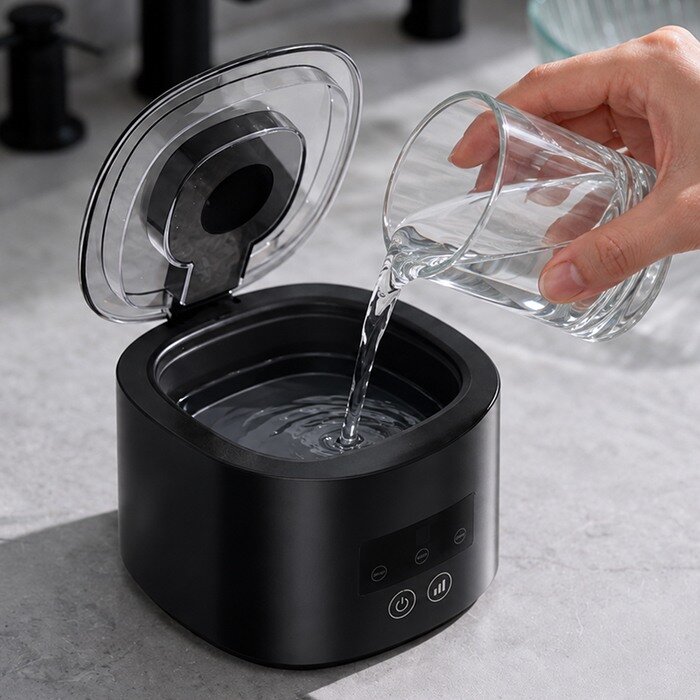 Add fresh water in the DentaSonic ultrasonic cleaner